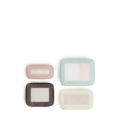 Monos × Reformation Compressible Packing Cubes