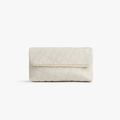 Cream | Front view of Monos x Reformation cosmetic pouch in cream