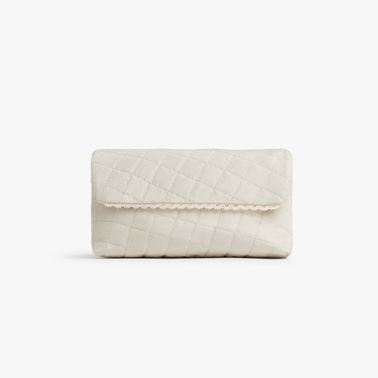 Cream | Front view of Monos x Reformation cosmetic pouch in cream