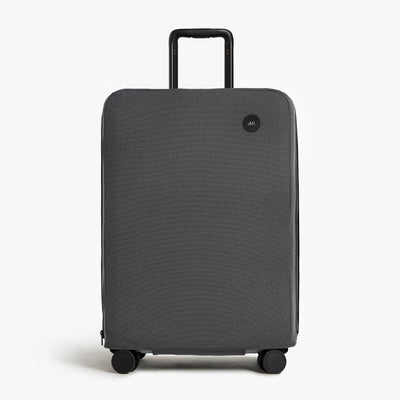 Expandable Check-In Medium | Front view of Expandable Check-In Medium Washable Luggage Cover in grey